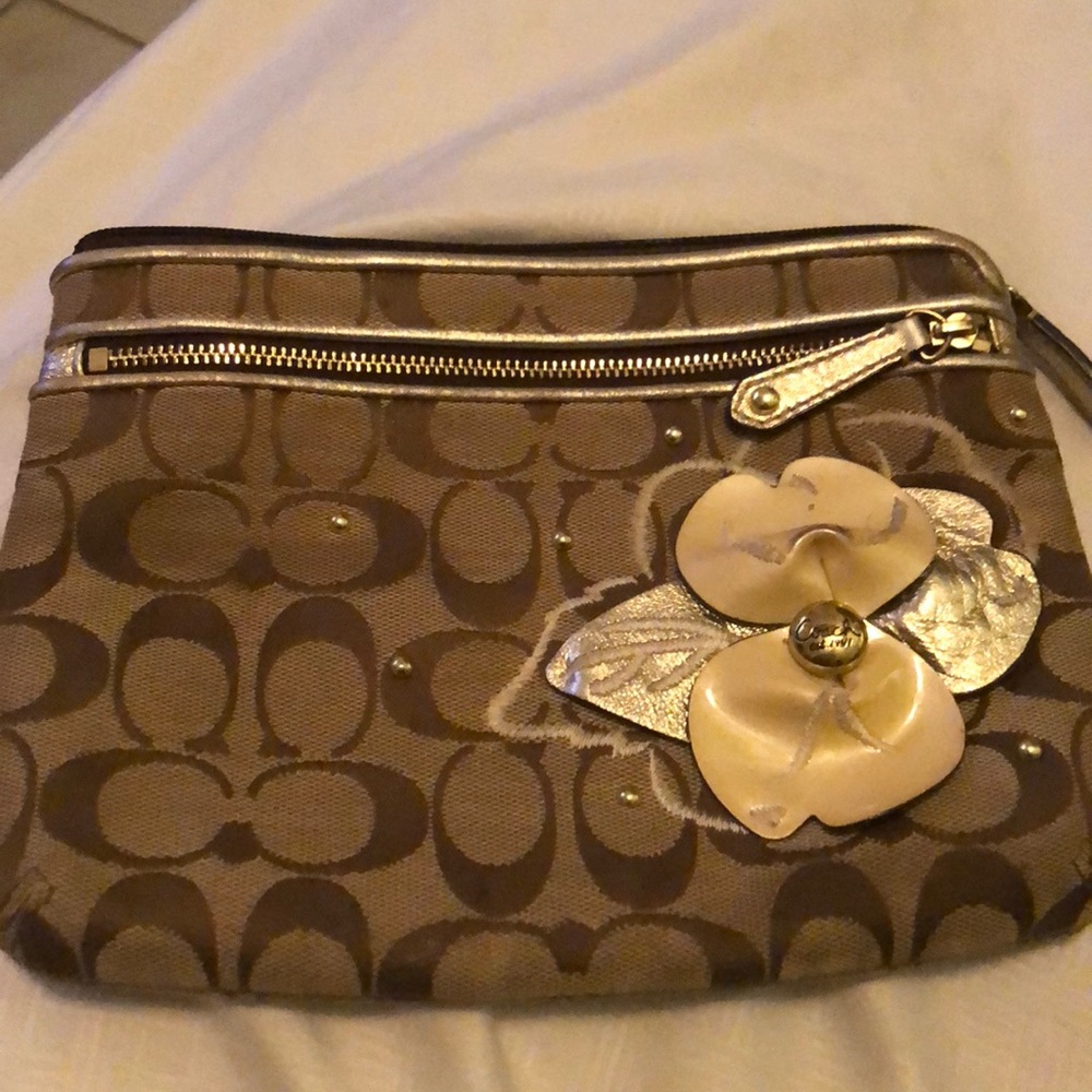 Authentic coach clutch